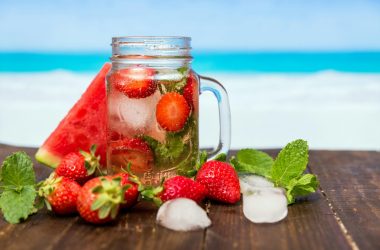 pexels-photo-616840-616840 Chilled drink with strawberries, watermelon, and mint in a mason jar, perfect for summer refreshment.